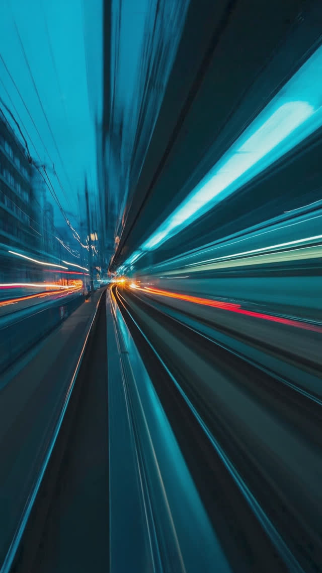 Motion-blurred view through a train window with rails and city lights streaking past, sense of speed and hum, cool tones